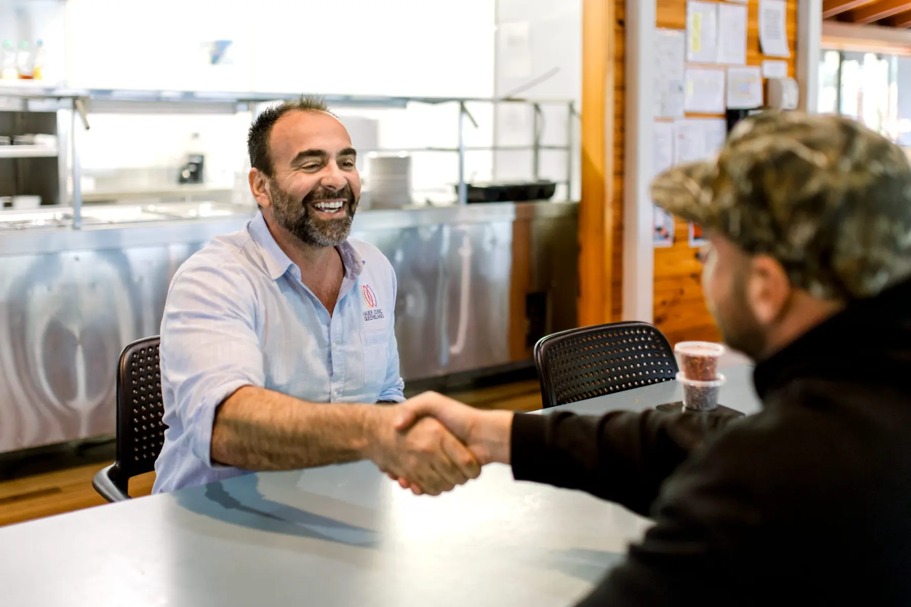 A Hader Clinic Queensland team member welcoming a veteran